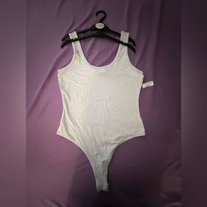 Brand new white onesie !